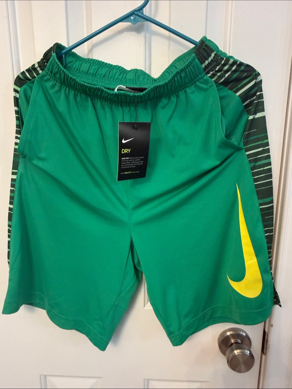 NWT Boy’s Nike Green Shorts with Yellow Swoosh